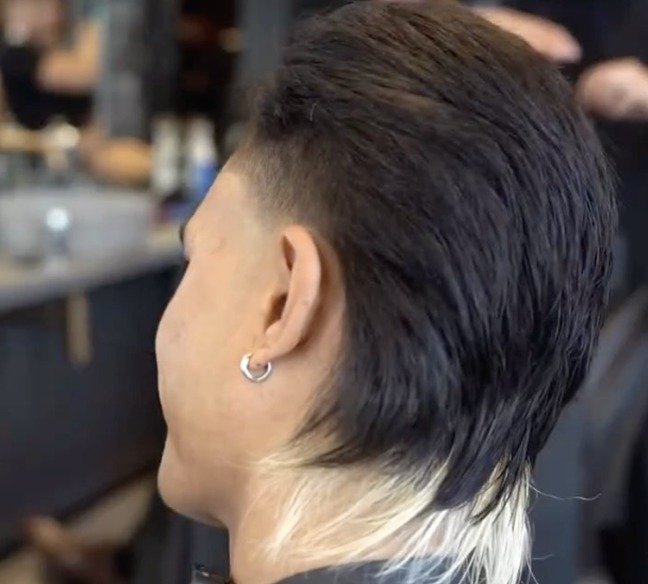 Modern scissor fade with razor design.