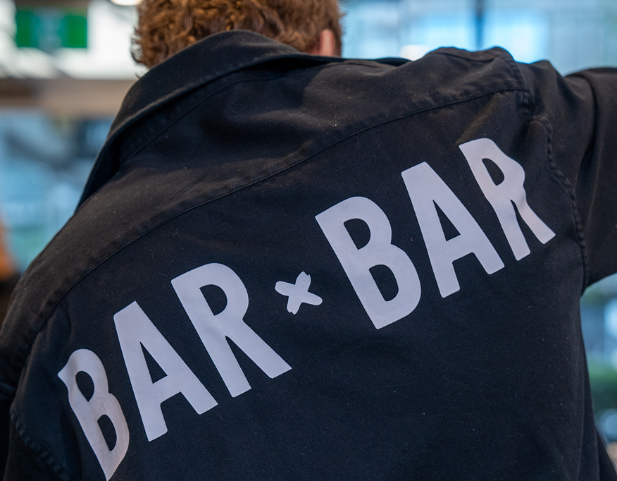 Bar x Bar branded shirt detail.