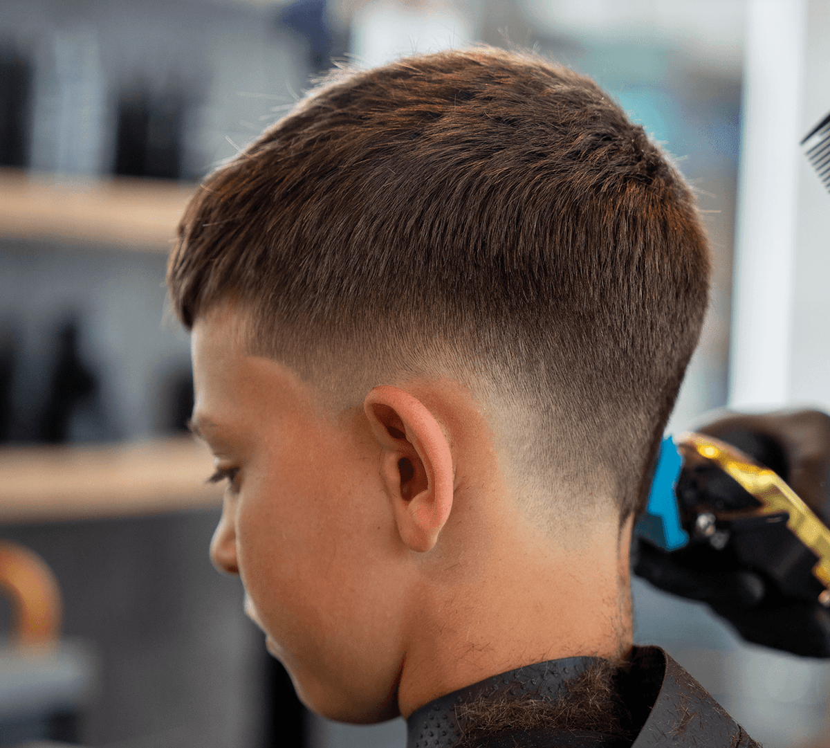 Buzz cut, clean and even.